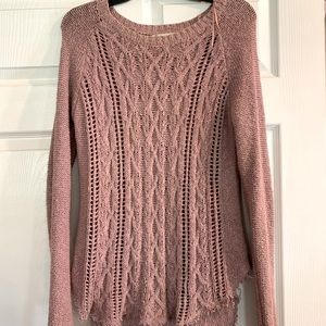 More of a Pink/Purple sweater